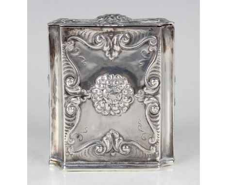 A Continental silver tea caddy, possibly Danish, of rectangular form with everted corners and hinged lid, embossed with folia