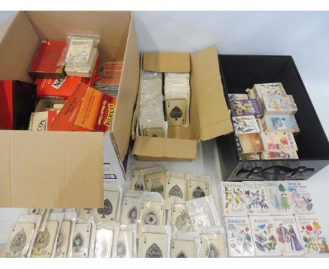 A large quantity of card games and playing cards.