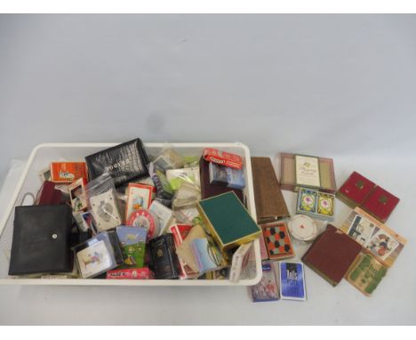 A large quantity of card games and playing cards.