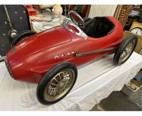 A large scale racing pedal car with wire wheels, windscreen, marked AR (Alfa-Romeo) to front.