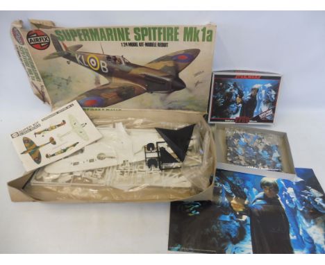 A 1/24 scale Airfix Supermarine Spitfire, box tatty but contents sealed. 