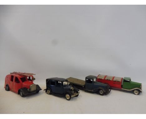 A Tri-ang Minic dustcart, a fire engine and taxi, with two keys and an early French truck by VeBe.