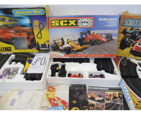 Three large scale Scalextric sets: 1970s Team Set 35, a Speed Challenge set and an Interlagos, unchecked. 