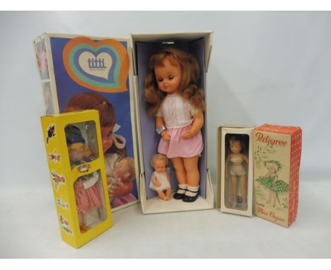 A boxed 1970s Italian doll, a Dutch Girl Pelham Puppet and an unusual Pedigree Little Miss Vogue. 