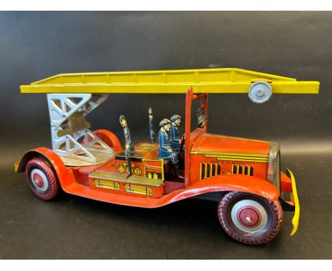 A Mettoy tinplate clockwork model of a fire engine, very good condition.