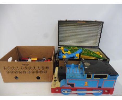A large quantity of Thomas the Tank Engine plus carry case. 