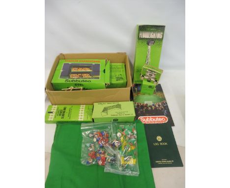 An assorted collection of Subbuteo including players, flood lights, accessories etc. 