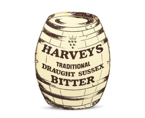 A vintage barrel shaped sign white brown lettering on cream, made for 'Harveys Traditional Draught Sussex Bitter'. With pierc