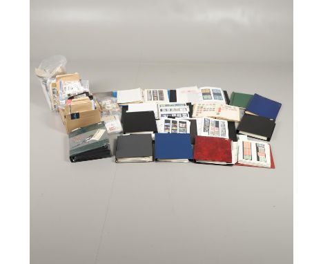 A large collection of 14 albums with used and mint stamps from QV to QE II, the majority of the lot with mint and used QE II 