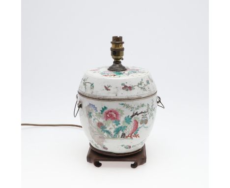 A two section porcelain jar now converted into a lamp, the jar painted with peony and flowering trees and flowers, with lugs 