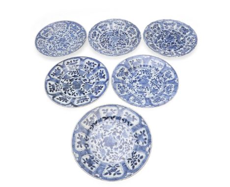 Six various Kangxi period Chinese blue and white plates, including three similar plates with floral designs (each with leaf m