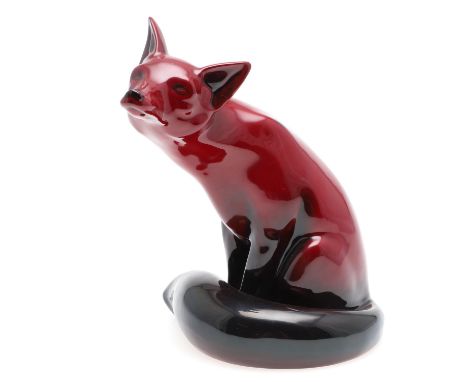 A large Royal Doulton flambe model of a seated Fox, with printed factory marks and original paper label to underside, height 