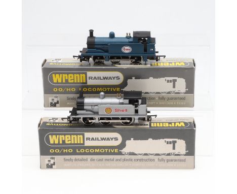 Including W2203 Shell tank locomotive with silver livery, also with W2201 Esso 38 with blue livery. Both with boxes and bookl