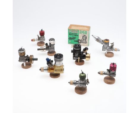 Eight various small model engines, including Alpha 21, Frog 249 marine engine (with box), Webra 2.5, and various others. All 