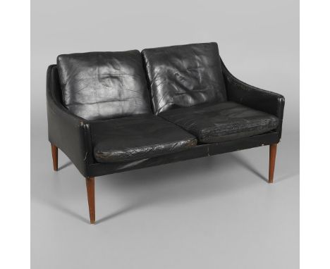 Model 800 and designed by Hans Olsen for C S Mobler, the black leather sofa with loose cushions, curved arms and supported on