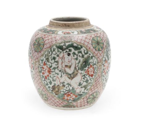 Kangxi period (1662-1722) the famille verte jar of gobular shape, painted with boys and foliage within shaped panels, with fu