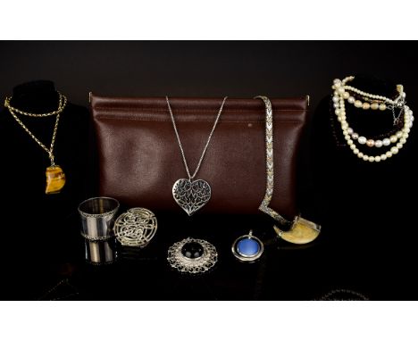 A Collection Of Silver And Mixed Metal Costume Jewellery Eleven items in total to include leather and shearling lined jewelle