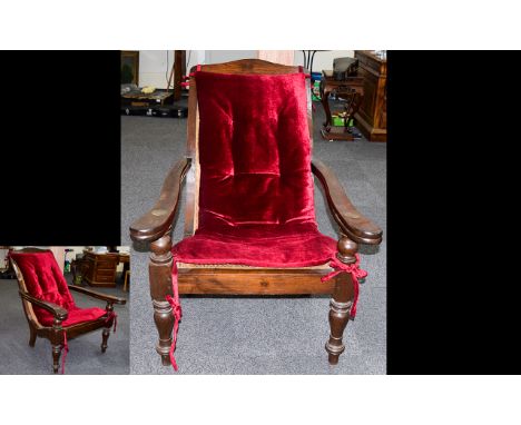 British Colonial Chinese Satinwood Caned Plantation Chair A wonderful long arm planters chair with hand-caning, turned legs a