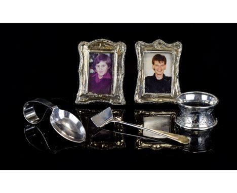 A Small Collection of Silver Items (5) in total. Comprises of a pair of silver miniature photograph frames, hallmark Birmingh