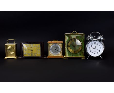 Collection of Mantle Clocks. To include oversized alarm clock, brass carriage clock, onyx clock etc