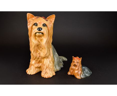 Beswick Yorkshire Terrier Figure Ceramic figure in the form of a Yorkie with red bow to head. Very good condition, marked to 