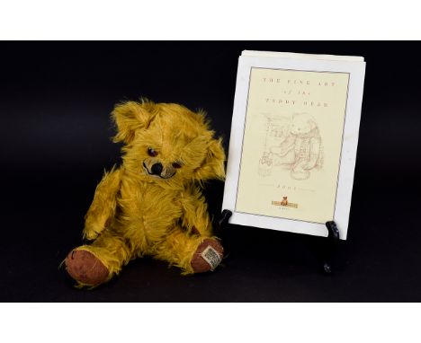 A Vintage Jointed Cheeky Bear By Merrythought 1950's jointed mohair teddy bear by British brand 'Merrythought' complete with 