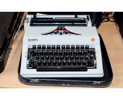A Vintage Olympia Regina De Luxe Typewriter including carry case.