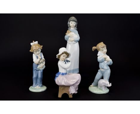 Nao by Lladro Figurines ( 4 ) Four In Total. Features Young Children with Animals ( 4 ) Tallest Figure 9.5 Inches. All 1st Qu