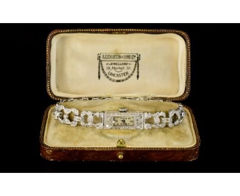 Ladies Art Deco Platinum & Diamond Bracelet Watch, Rectangular Case, Manual Wind Movement Marked Reno W. Co, Milgrain Set Dia