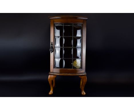 Small Oak Bow Fronted Cabinet, Leaded Glass Door (One Panel Broken) Raised On Short Cabriole Legs, Height 29 Inches