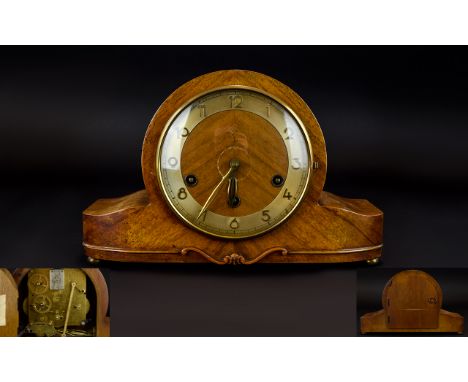 Art Deco Period Mantle Clock Wood cased arch top clock with brass tone dial and brass ball feet. Good condition, length, 12 i