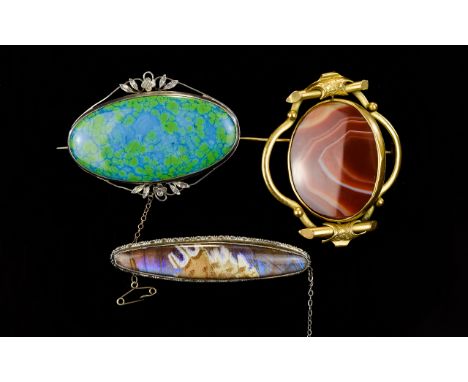 A Trio Of Antique Brooches Three brooches to include silver Ruskin brooch of oval form with large central blue and green cera