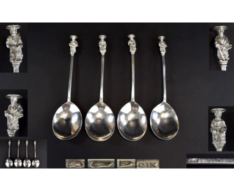 18th Century Matched Set of Four Silver Spoons with Later Attached White Metal Figural Finials. (The finials are not hallmark