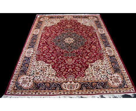 A Large Woven Silk Carpet Keshan rug with beige ground and traditional Middle Eastern floral and foliate border detail with c