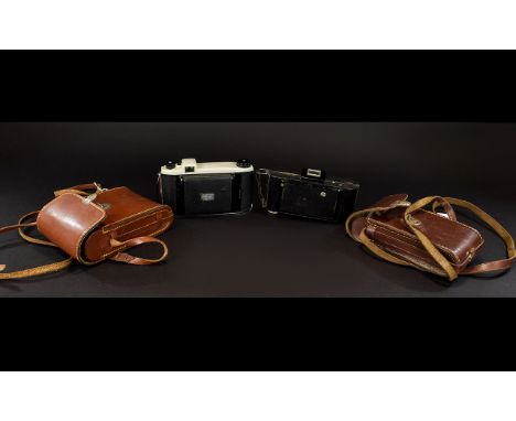 Two Vintage Cameras To include one Kodak, each housed in original brown leather carry cases. Good condition