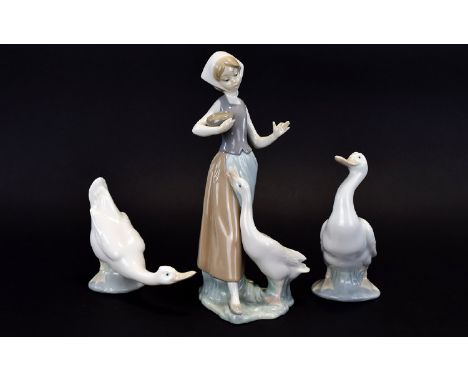 Lladro Figure ' Girl with Duck ' Model No 1052. Issued 1991 - 1993. Height 9.5 Inches + Two Nao by Lladro Large Duck Figures.