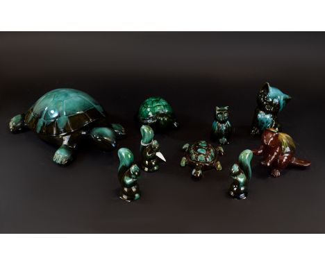 A Collection Of Green/Black Blue Mountain Animal Ceramic Figures comprising of three tortoises, three squirrels, two cats and