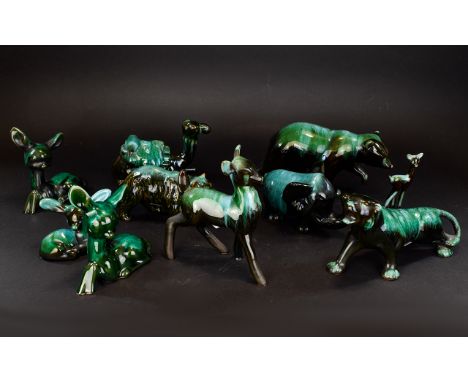 A Collection Of Green/Black Blue Mountain Ceramic Figures comprising of five wildlife animals, five deer's and one camel. 