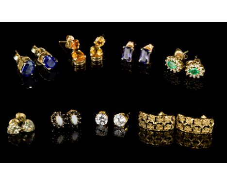 A Collection of Eight ( 8 ) Pairs of Stone Set 9ct Gold Earrings. All Marked for 9ct Gold, Various Stones Set, Includes Diamo