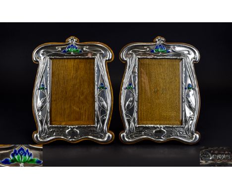 A Fine Pair of Art Nouveau Period Silver, Enamel and Oak Photograph Frames, Both with Mark of Walker and Hall. Chester 1903. 