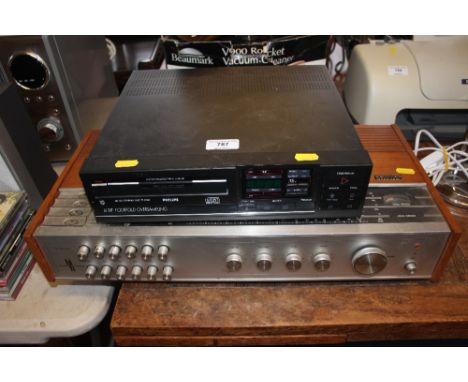A Phillips Compact disk player together with a Phillips tuner 