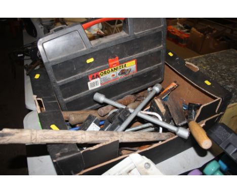 A box of various hand tools