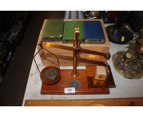A set of postage scales and weights
