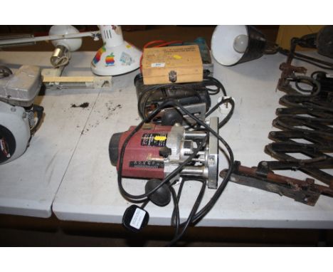A quantity of electric tools to include two jigsaws; router and a router piece set