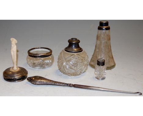 A mixed lot of silver mounted glass jars together with a silver handled button hook