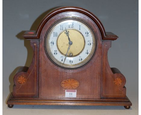 An Edwardian mahogany and satinwood inlaid cased mantel clock, having enamelled chapter ring with Arabic numerals 