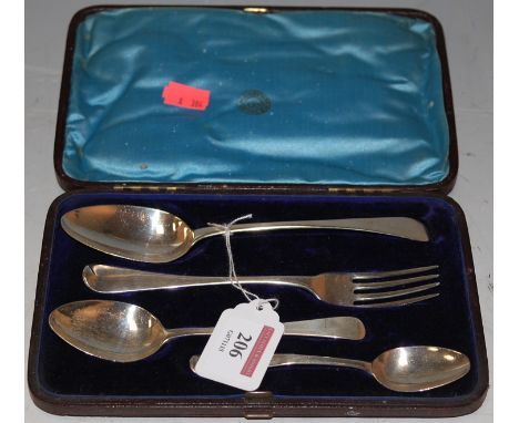 Cased silver flatware to include; three spoons and a fork (none matching)