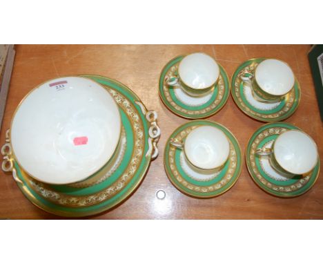 A Victorian part tea service on a green ground with gilt decoration (a/f)