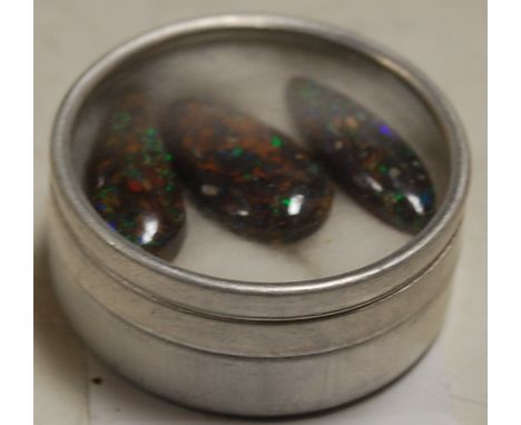 Three Koroit Yowah Nut boulder opals from Australia, weighing 12.3ct, 14.8ct, and 6.2ct respectively 