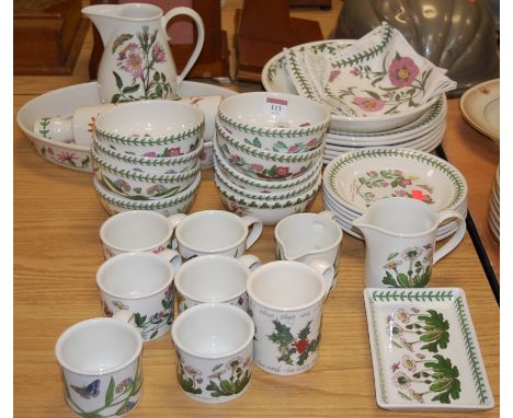 A collection of Portmeirion Botanic Garden  table wares to include dinner plates, side plates, and rolling pin, etc